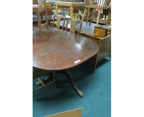A MAHOGANY DINING ROOM TABLE,  with one loose leaf on tripod support