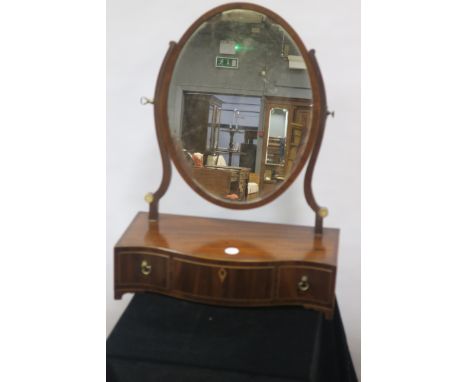 A 19TH CENTURY MAHOGANY AND MARQUETRY DRESSING TABLE MIRROR, the oval plate with shaped side supports above the serpentine ba