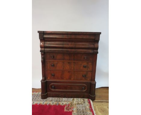 A 19TH CENTURY MAHOGANY FRAMED SCOTCH CHEST the rectangular breakfront top above two bowed drawers with a further three deep 