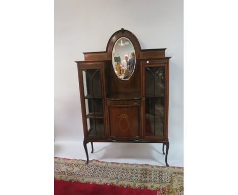 A NEO CLASSICAL STYLE MAHAGONY AND SATINWOOD INLAID DISPLAY CABINET, the raised superstructure with an oval bevelled plate fl