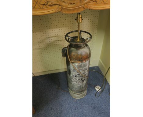 A COPPER LIGHT, in the form of a fire extingusher