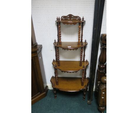 A GOOD VICTORIAN ROSEWOOD FOUR TIER WHAT NOT, each moulded shelf joined by a barley twist upright on baluster legs,132cms hig