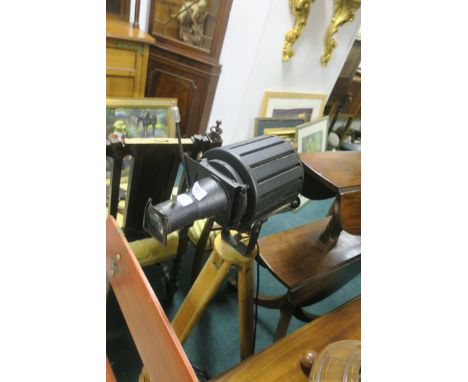 A 20th CENTURY SLIDE PROJECTOR, BY ANTONI VOHRALIK, on collapsible wooden tripod base, 110cms high.