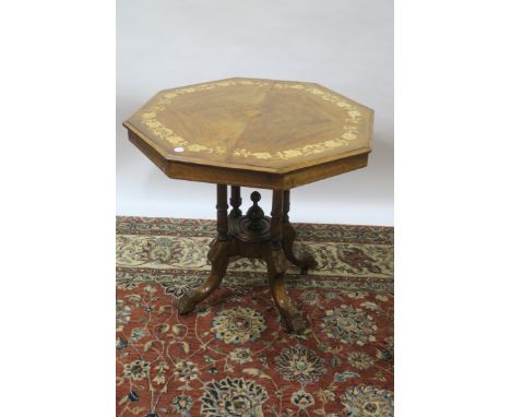 A 19TH CENTURY BURR WALNUT AND MARQUETRY INLAID OCCASIONAL TABLE the octagonal shaped top with radiating veneer and a foliate