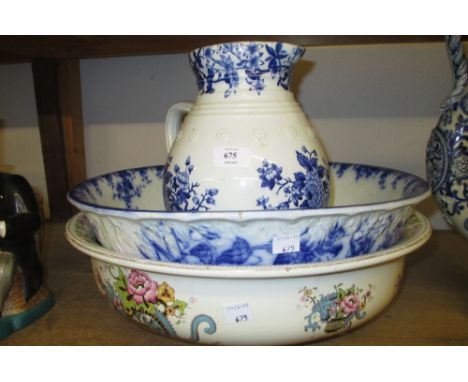 Blue and white wash basin, similar blue and white floral decorated jug and a 19th Century wash basin
