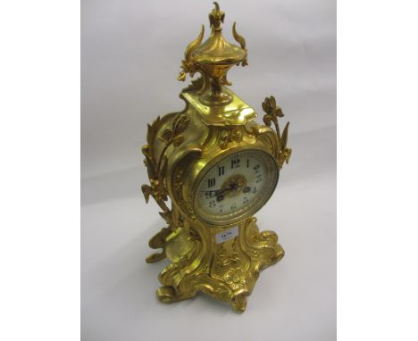 Late 19th / early 20th Century French gilt brass Art Nouveau mantel clock having circular dial with Arabic numerals and two t