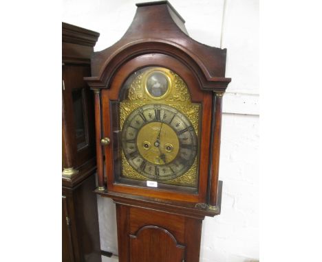 19th Century mahogany longcase clock having arched hood with brass dial and silvered chapter ring with Roman numerals, date a