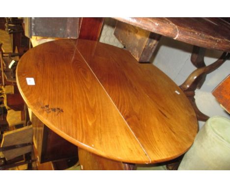 18th Century fruitwood pedestal table, the tilt top above a baluster turned column support and tripod