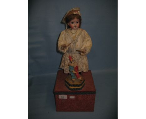 Reproduction musical doll automaton in the form of a girl puppeteer, 18ins high 