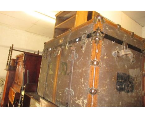 Large late 19th or early 20th Century wooden brass and leather bound travelling trunk