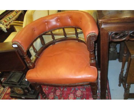 Victorian walnut and leather upholstered desk chair, the horseshoe shaped back with button upholstery on baluster turned upri