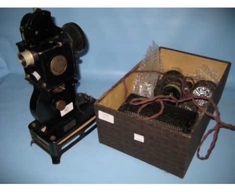 Early 20th Century British ' Baby ' cine projector together with approximately thirty various films circa 1920