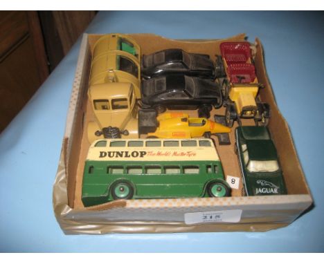 Dinky Toys model double decker bus, Dunlop, the World's Master Tyre, together with a Dinky rubbish truck finished in beige an