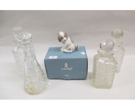 Boxed Lladro figure of a puppy and various cut glass decanters