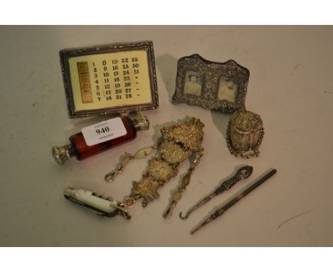 19th Century ruby glass double ended scent bottle, silver mounted perpetual calendar, small silver mounted photograph frame, 