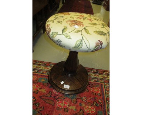 19th Century rosewood circular upholstered piano stool on hexagonal baluster column support