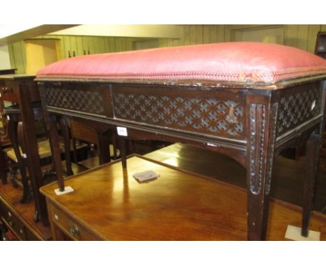 Early 20th Century mahogany duet piano stool with an upholstered seat above a blind fretwork freize raised on square tapering