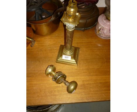 Brass Corinthian column table lamp together with a pair of brass knob handles