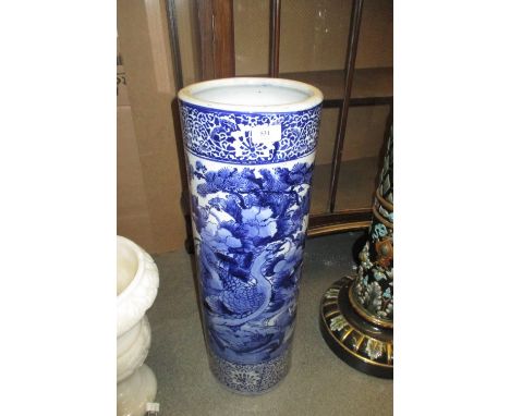 Late 19th Century Japanese blue and white cylindrical stick stand decorated with birds and foliage