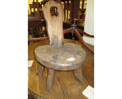 19th Century pine milking stool together with three similar smaller stools