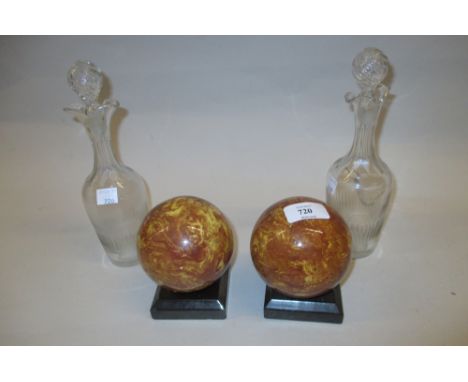 Pair of 19th Century pottery carpet bowls decorated with brown mottled glazes mounted on square plinth bases