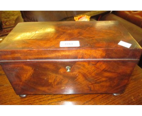 Early 19th Century rectangular mahogany tea caddy raised on bun supports