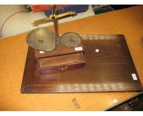 Pair of gilt brass and wooden scales together with a mahogany shove ha'penny board