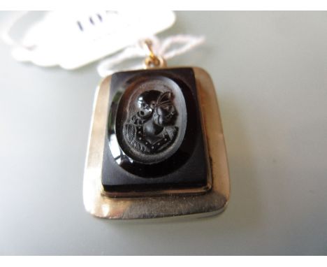 19th Century gold locket mounted with a carved cameo portrait of a Roman Centurion 