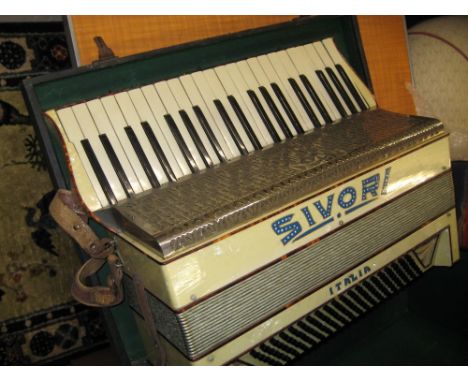 Italian one hundred and twenty button piano accordion by Sivori in a fitted case