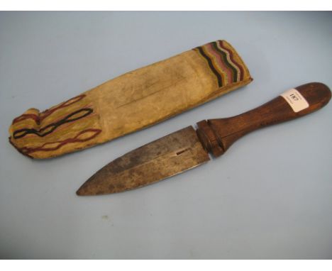 Hide and beadwork sheath, possibly North American Indian or native African housing a dagger, the blade marked Sorby