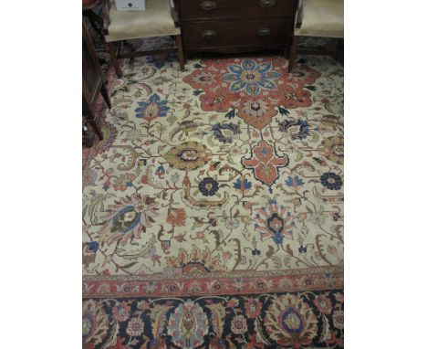 Sparta carpet with medallion and all-over palmette design on an ivory ground with borders, 12ft x 9ft approximately (some wea