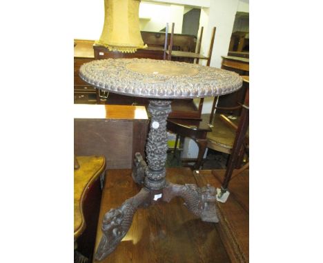 19th Century circular carved oriental tripod table, together with a rectangular occasional table with later applied mouldings