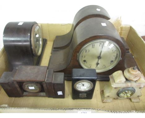 Three oak cased dome shaped mantel clocks and three other mantel clocks