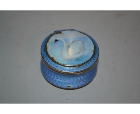 Small circular blue enamel pot and cover decorated with a figure of a swan (a/f)