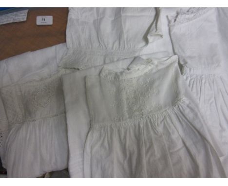 Bag containing two vintage Christening gowns, petticoat and a pair of bloomers
