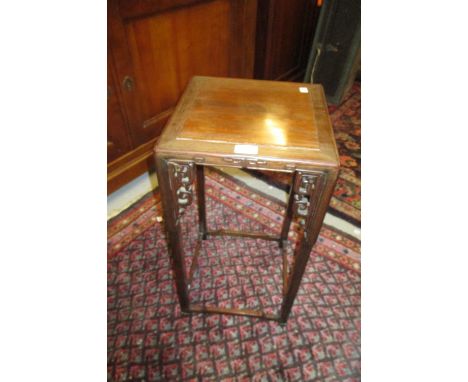 Late 19th or early 20th Century Chinese carved hardwood lamp table on slender supports with stretchers together with another 