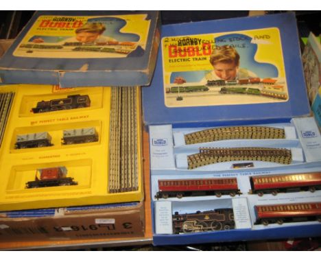 Three boxes containing a large collection of Hornby Dublo model railway