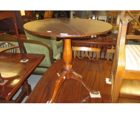 19th Century mahogany circular pedestal table with a turned column support and tripod base (crack to top)