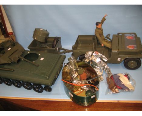 Action Man with miscellaneous accessories including jeep, tank and search light etc.