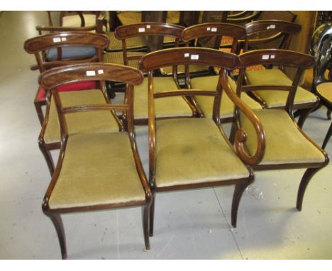 Set of seven (six plus one) Regency mahogany dining chairs, the moulded rail backs above drop-in seats and sabre supports tog