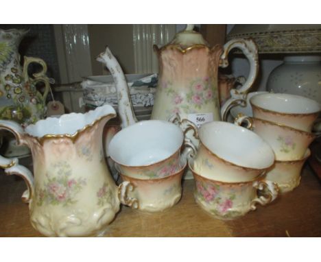 Limoges floral and gilt decorated tea service comprising:  cups, saucers, teapot, sugar bowl, hot water pot etc.