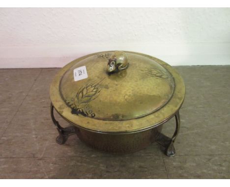Art Nouveau embossed brass circular box and cover, the handle in the form of a mouse, the lid decorated with stylised wheat e