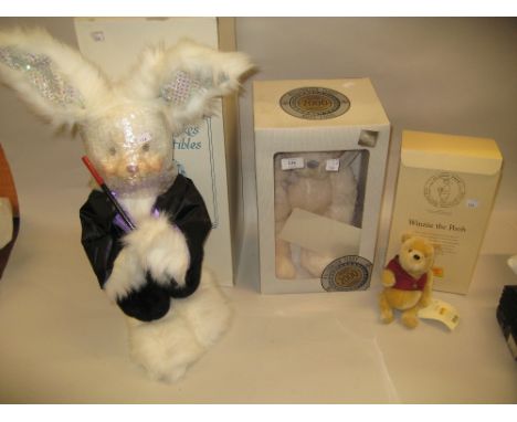 Steiff ' Winnie the Pooh ' bear in original box, a ' Russ Millennium ' teddy bear in original box and a ' Robert Rakes ' soft