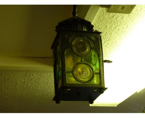 Late 19th / early 20th Century black painted iron and leaded coloured glass hall lantern