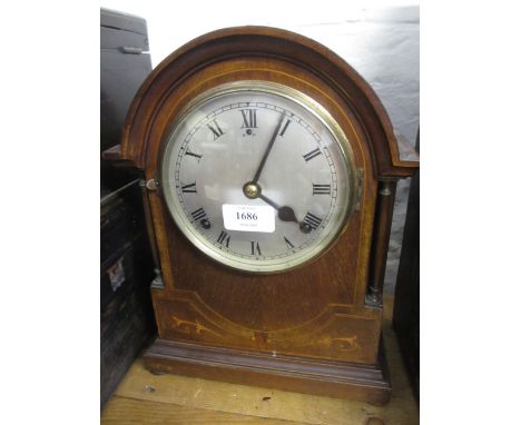 Edwardian mahogany and line inlaid mantel clock, the silvered dial with Roman numerals and two train movement