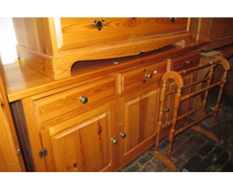 Reproduction pine dresser with boarded shelf back above three drawers and three cupboard doors together with a small pine ref