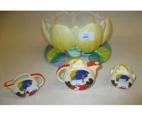 Clarice Cliff Lotus pattern vase, together with a Staffordshire pottery miniature teaset in Clarice Cliff style