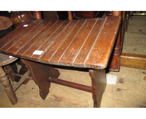 20th Century oak trestle type stool, another stool on turned supports, small child's chair and a firescreen / table with tape