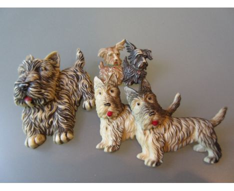 Three Art Deco style composite dog brooches