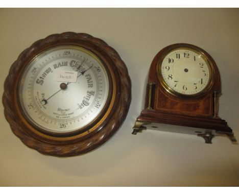 Edwardian mahogany inlaid and brass mounted dome shaped mantel clock, together with an oak cased aneroid barometer with rope 